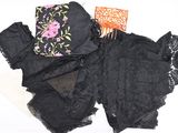 several pieces of clothing are laid out on a white surface