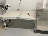 an image of a hospital room with a table and a blow dryer