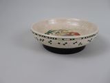 a small bowl that has a design on it