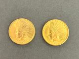 two gold coins with indian head on them
