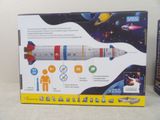 a box with a model of a space rocket in it