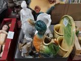 many different items in a box on the table