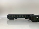 a black train car that is sitting on a table