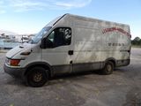 an image of a delivery truck parked in a parking lot