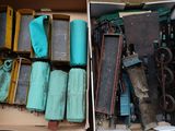 two boxes with different types of electronic equipment in them