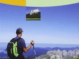 the cover of a book with a man hiking on a mountain