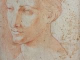 an image of a drawing of a woman ' s face on a piece of paper