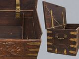 a small wooden box that has a handle on it