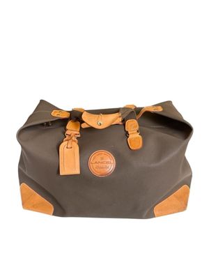 une photo d'un sac gris et marron muni de anses en cuir