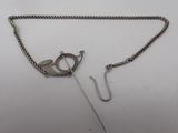 a close up of a chain with a hook attached to it