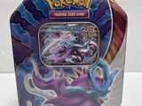 pokemon trading card game tin with a picture of a purple and blue dragon