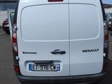a white van that is parked in a parking lot