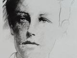 a black and white photo of a woman ' s face with a black and white background