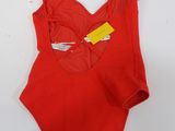 a red swimsuit with a yellow tag on it