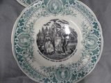 two plates with a picture of a man and a woman on them