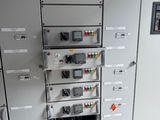 a control panel with many different types of electrical equipment