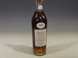 an image of a bottle of wine sitting on a table