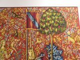 a picture of a tapestry hanging on a wall