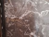 a picture of a picture of a marbled surface in a picture frame