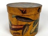 a wooden box with a painting of vegetables on it