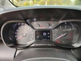 a close up of a car dashboard with a speedometer