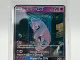 a close up of a card in a plastic case on a table