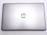 a laptop that is sitting on a white table