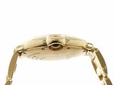 a close up of a gold watch with a chain around it
