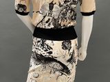 an image of a mannequin wearing a dress with a floral pattern