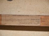 a baseball bat that is on a shelf in a room
