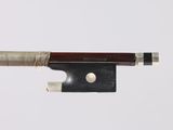 a close up of a violin bow on a white background