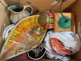 a cardboard box filled with assorted items and items