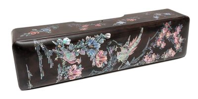 a black case with flowers and birds on it