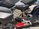 a motorcycle that is parked on the side of the street