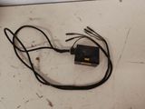a picture of a computer mouse and wires on the floor