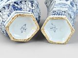 pair of chinese blue and white vases with gold trim