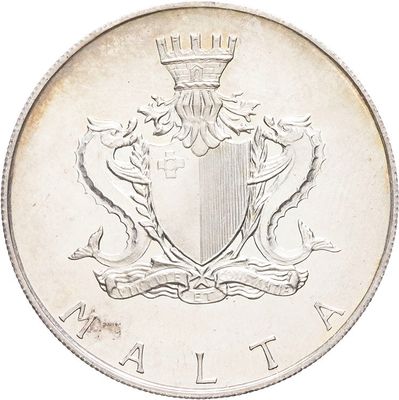 an image of a coin with a coat of arms and a crown on it