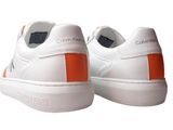 white and orange sneakers with white soles on a white background