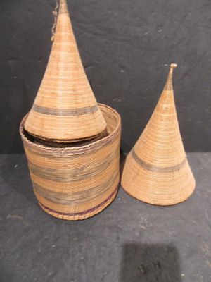 two baskets that are sitting next to each other on a table