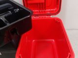 two red and black boxes sitting next to each other