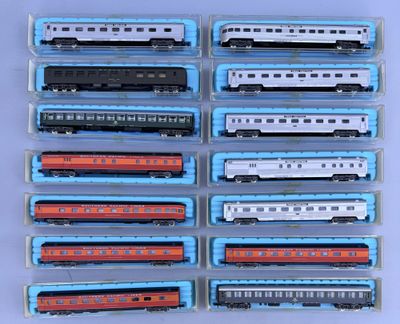 a lot of toy trains sitting on a table
