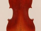 an old violin with a wooden back and a wooden bow