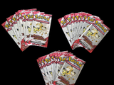 four packs of pokemon playing cards sitting on top of each other