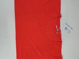 the red t - shirt has a zippered pocket at the bottom