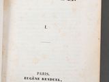 an old book with a black and white title on it