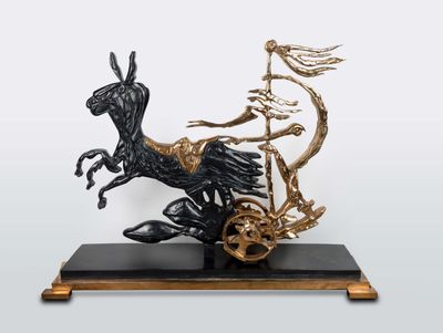 bronze sculpture of a horse pulling a cart with a man on it