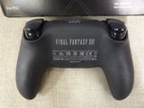 the box of the game controller is next to the box of the game controller