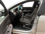 the interior of a car with the door open and the driver ' s seat up