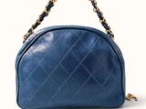 chanel blue quilted leather handbag with gold chain strap