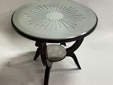 a glass table with a starburst design on it